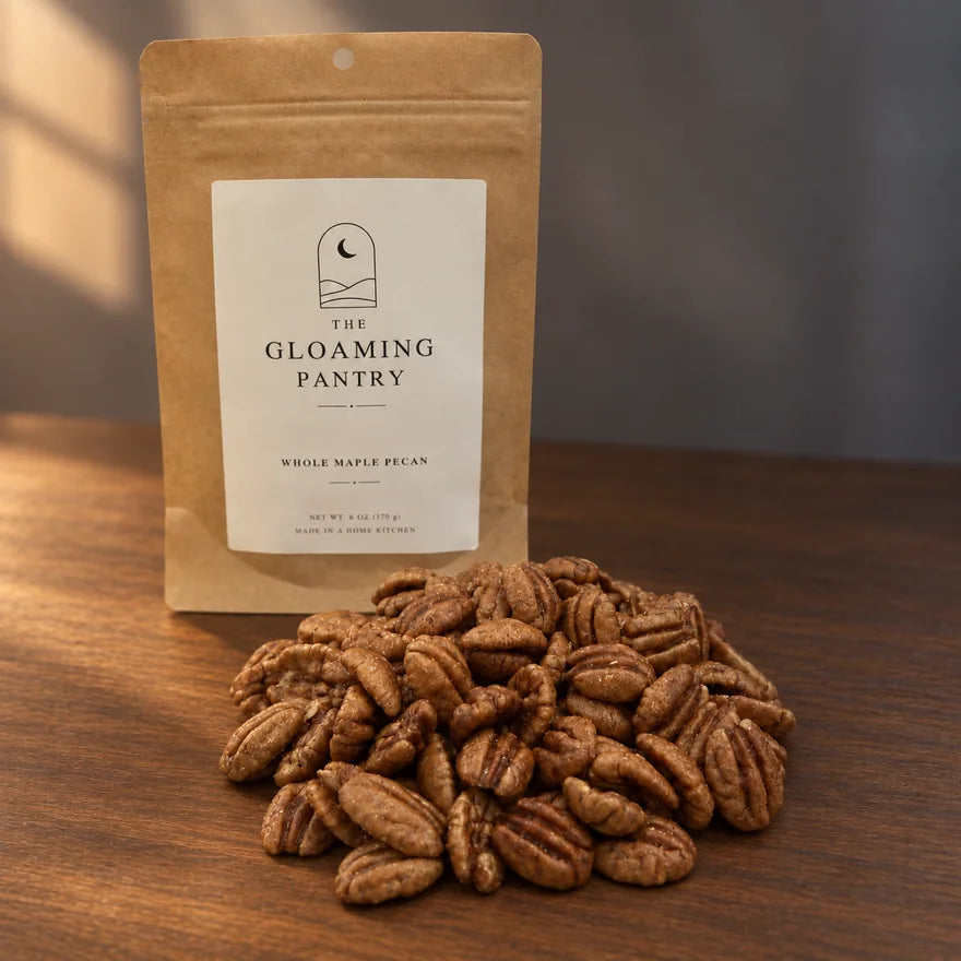 Branded kraft pouch of Whole Maple Pecan with maple-coated pecan halves